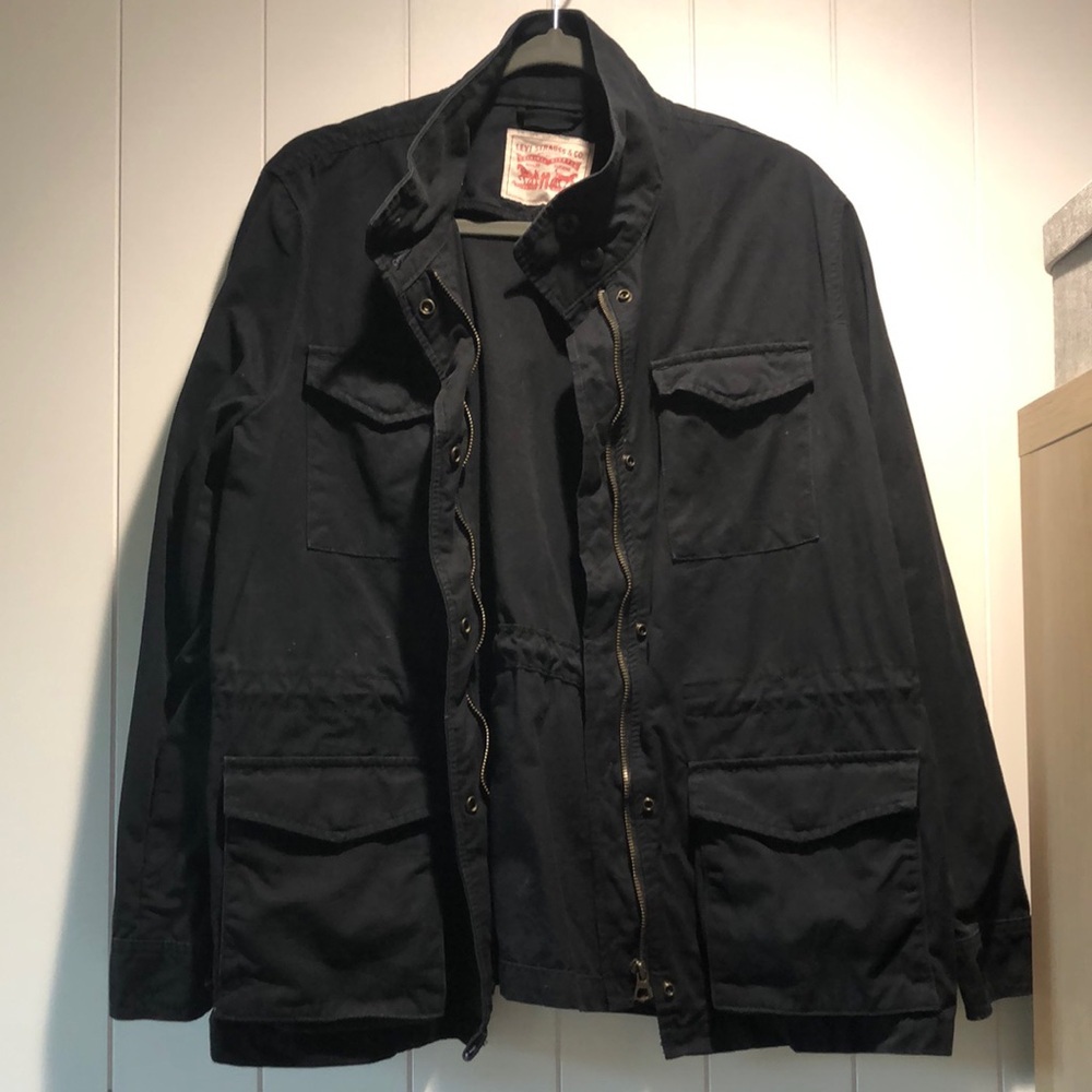 Levi’s women’s black canvas multi pocket jacket snaps and zipper closure L